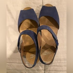Blue suede with slight heel dansko with Velcro on strap to secure comfortably